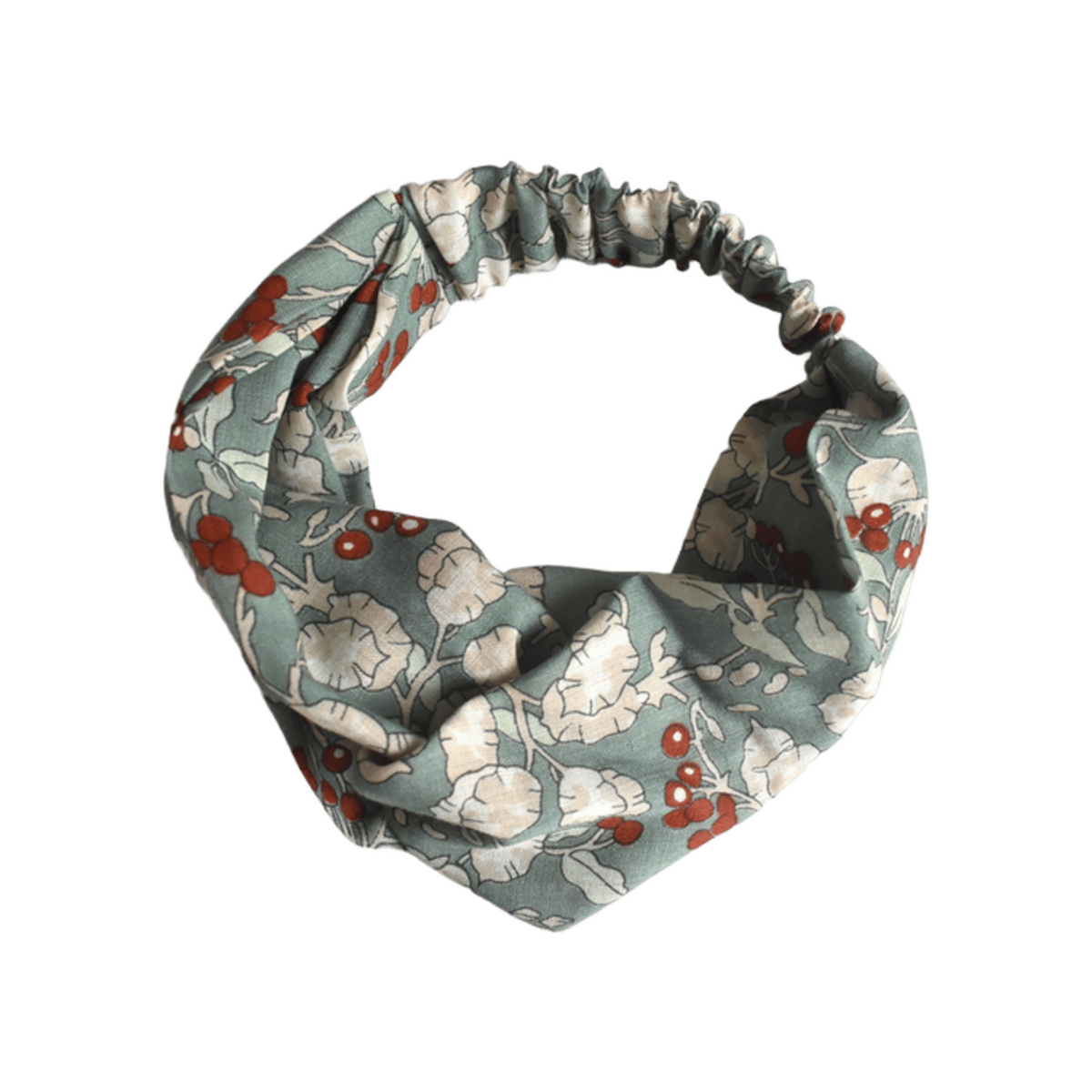 A fabric headband with a gathered elastic back, featuring a muted sage green background with a white floral pattern and small red berry accents, shown on a plain white background.