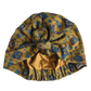 A mustard yellow vintage liberty fabric hair turban with a blue and purple floral pattern, featuring a elasticised ruffled bottom, silk or cotton lined