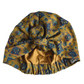 A mustard yellow vintage liberty fabric hair turban with a blue and purple floral pattern, featuring a elasticised ruffled bottom, silk or cotton lined