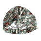 A SIlk & Lawn turban bonnet with a vintage Liberty wool in sage green floral and berry print, featuring a top knot and an elasticated back for comfort 
