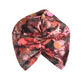 The reverse or back side of a knotted turban-style headscarf with a vibrant floral print in shades of red, pink, orange, and dark brown, featuring Liberty Myrtle & Mary Tana Lawn Cotton by hair accessories brand Silk & Lawn