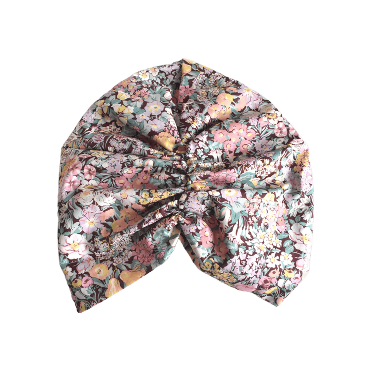 A knotted fabric headwrap or turban-style hair accessory with Liberty Cottage Garden Tana Lawn cotton back view of turban